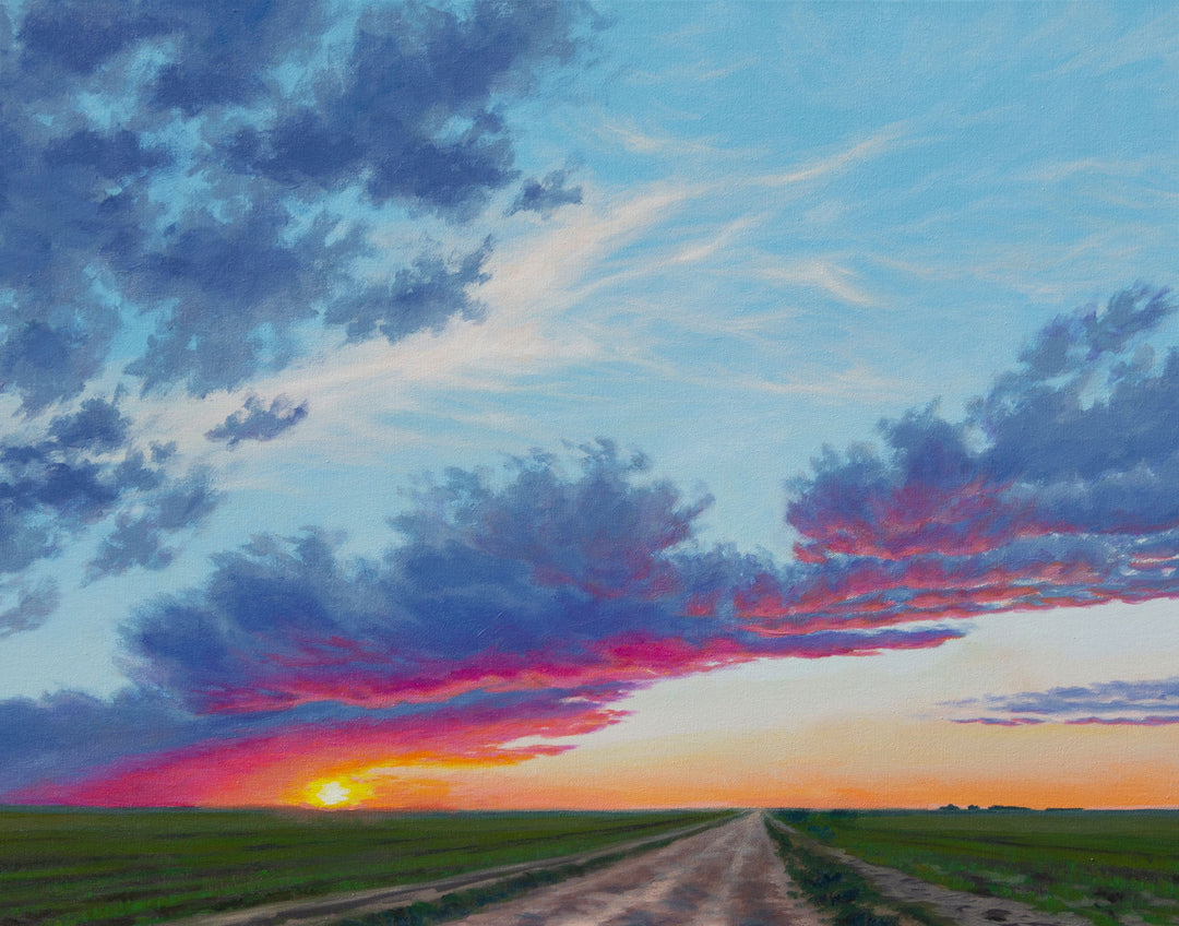 A horizontal painting showing a vibrant sunset over green fields and a dirt road.