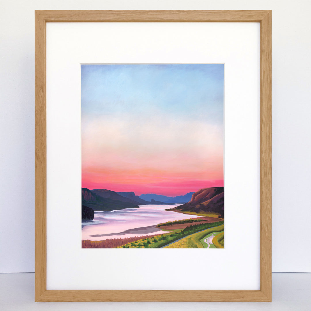 Framed vertical art print showing a graphic river gorge at sunset.